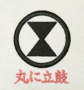 丸に立鼓