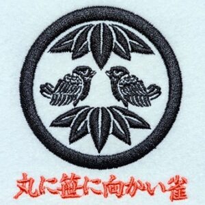 丸に笹に向かい雀